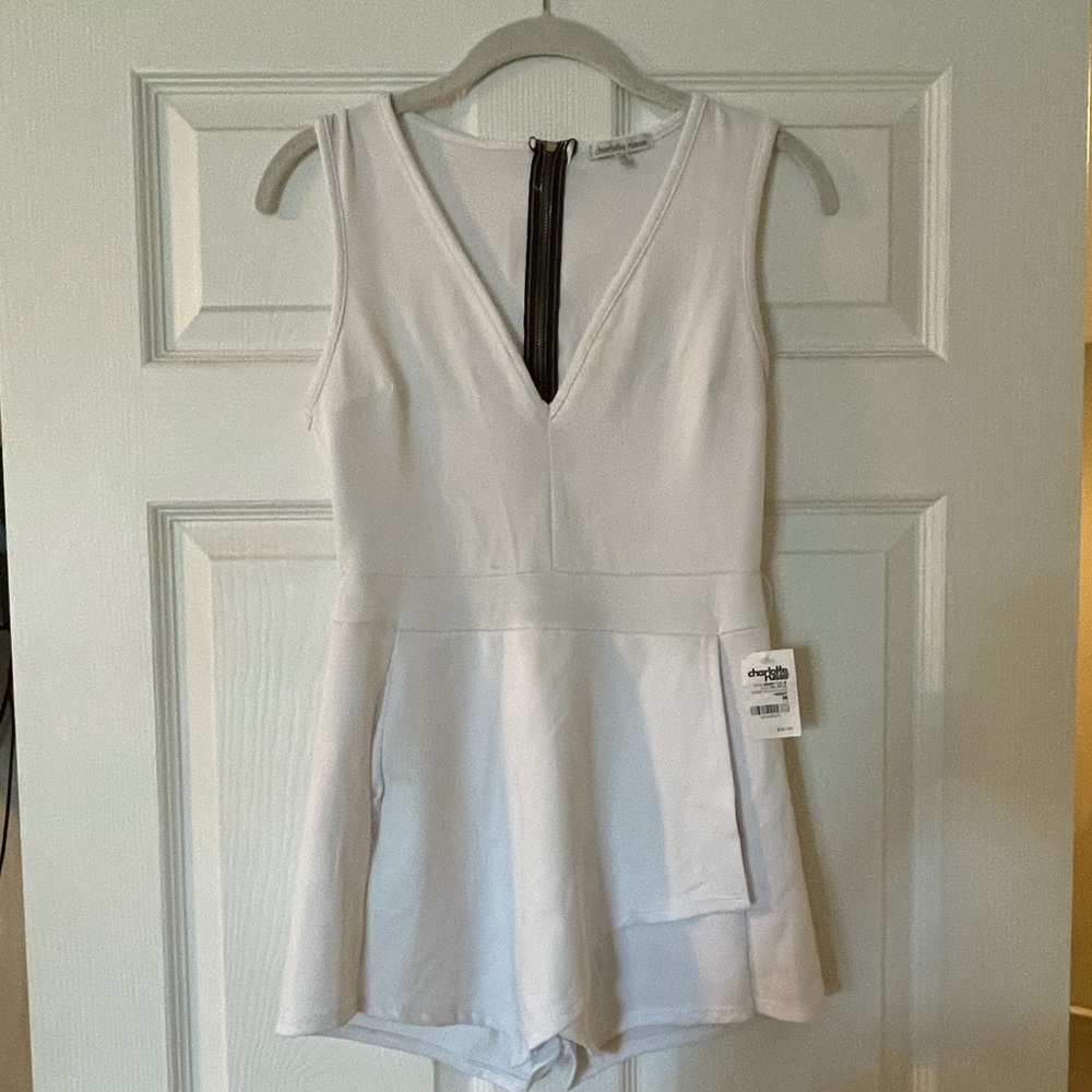 Never worn but so cute, white shorts romper